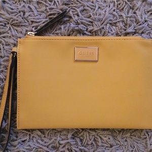 GUESS women zip top wristlet.
